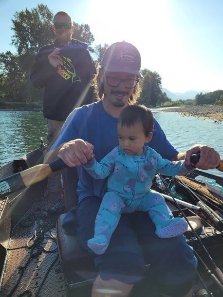 Family on a fishing boat